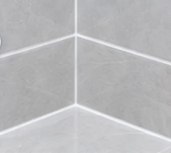 After: clean new epoxy grout in the same corner