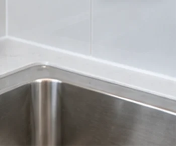 After: clean new silicone around the same sink