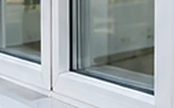 Window frame sealed with weatherproof caulking