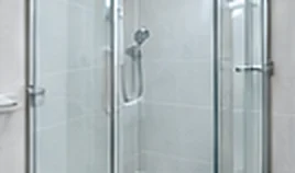 Resealed glass shower enclosure